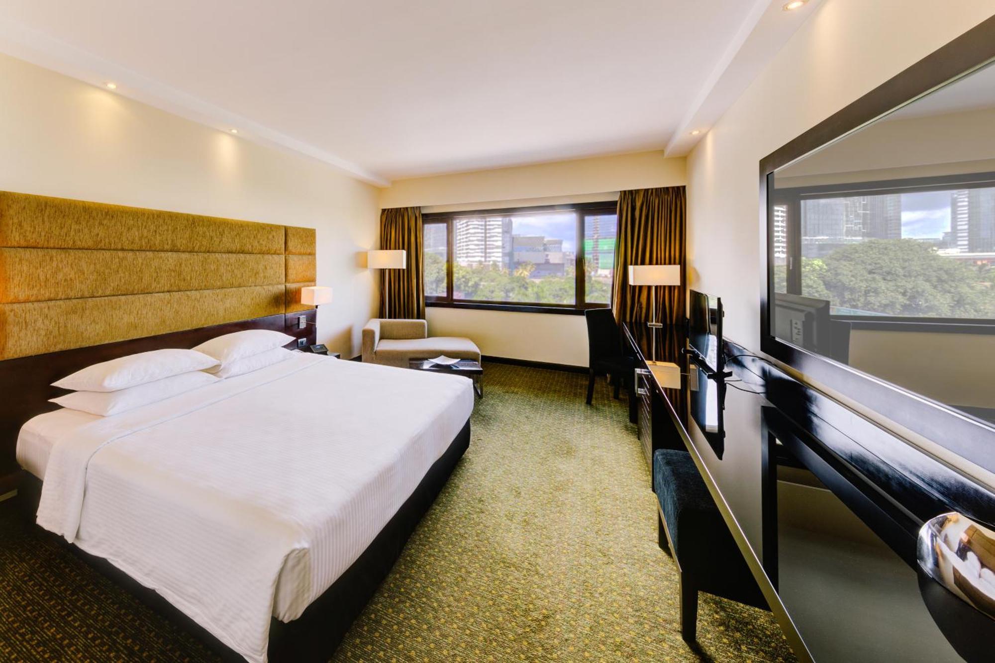 Cinnamon Lakeside Colombo Kültér fotó A room at the hotel